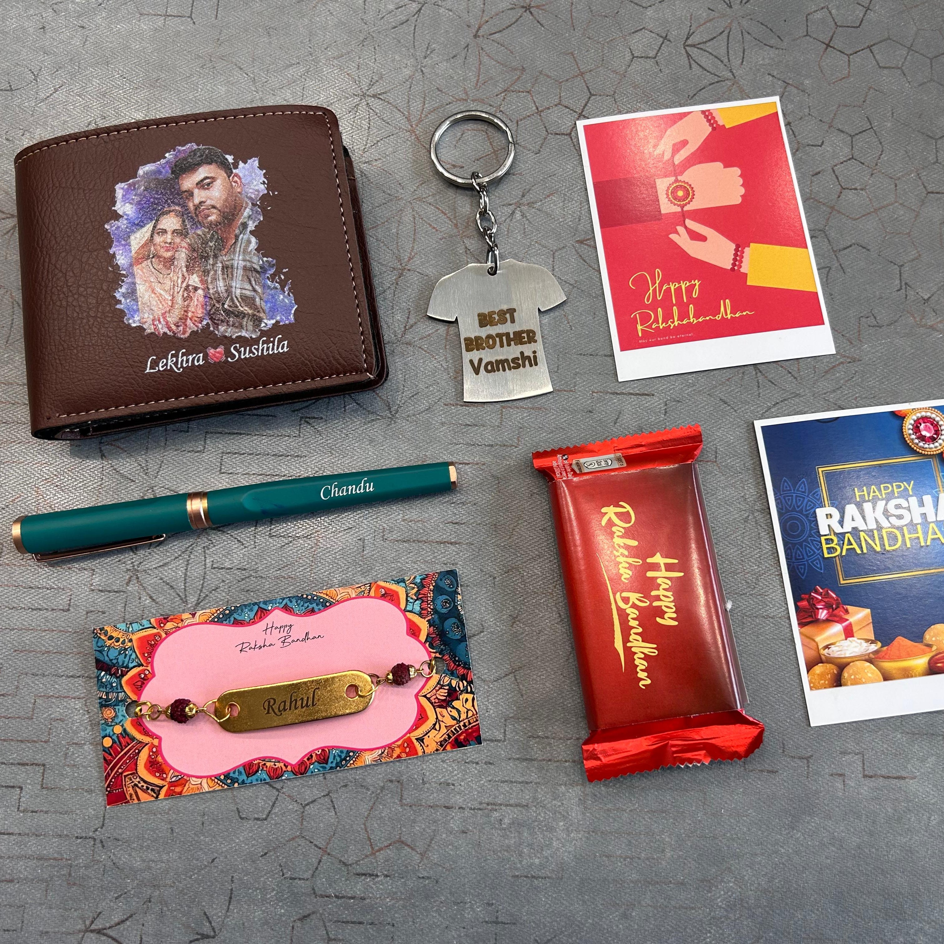 Collection of Raksha Bandhan-themed items including a wallet, keychain, card, and candy on a textured surface. - The Gifting Era