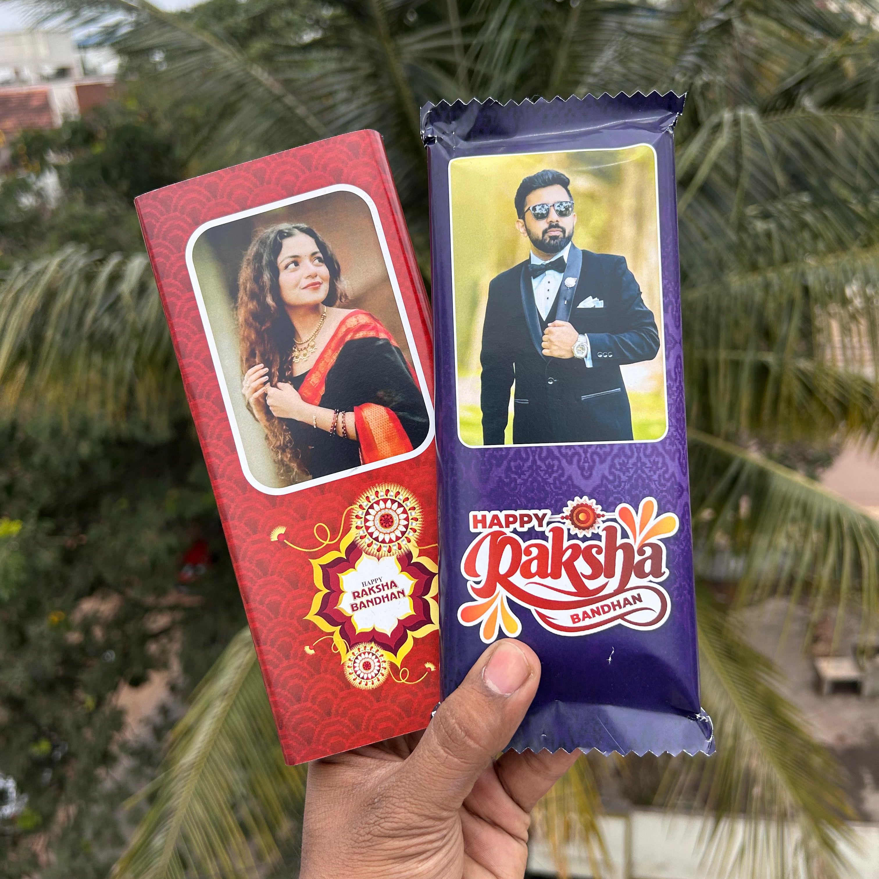 Two chocolate bars with images of a couple on them, held against a palm tree background. - The Gifting Era