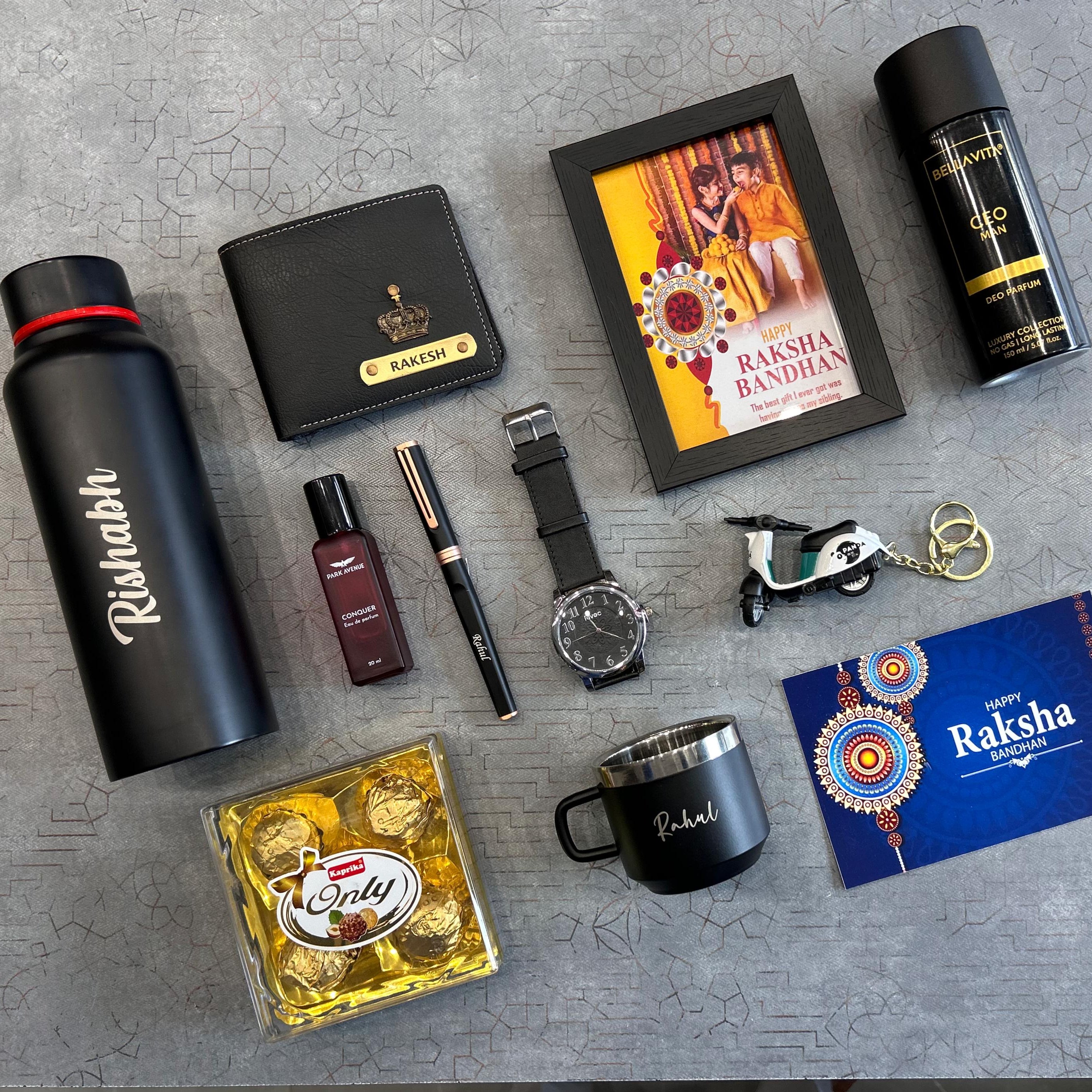 Collection of Raksha Bandhan-themed gifts including a water bottle, wallet, photo frame, and keychain on a gray surface. - The Gifting Era