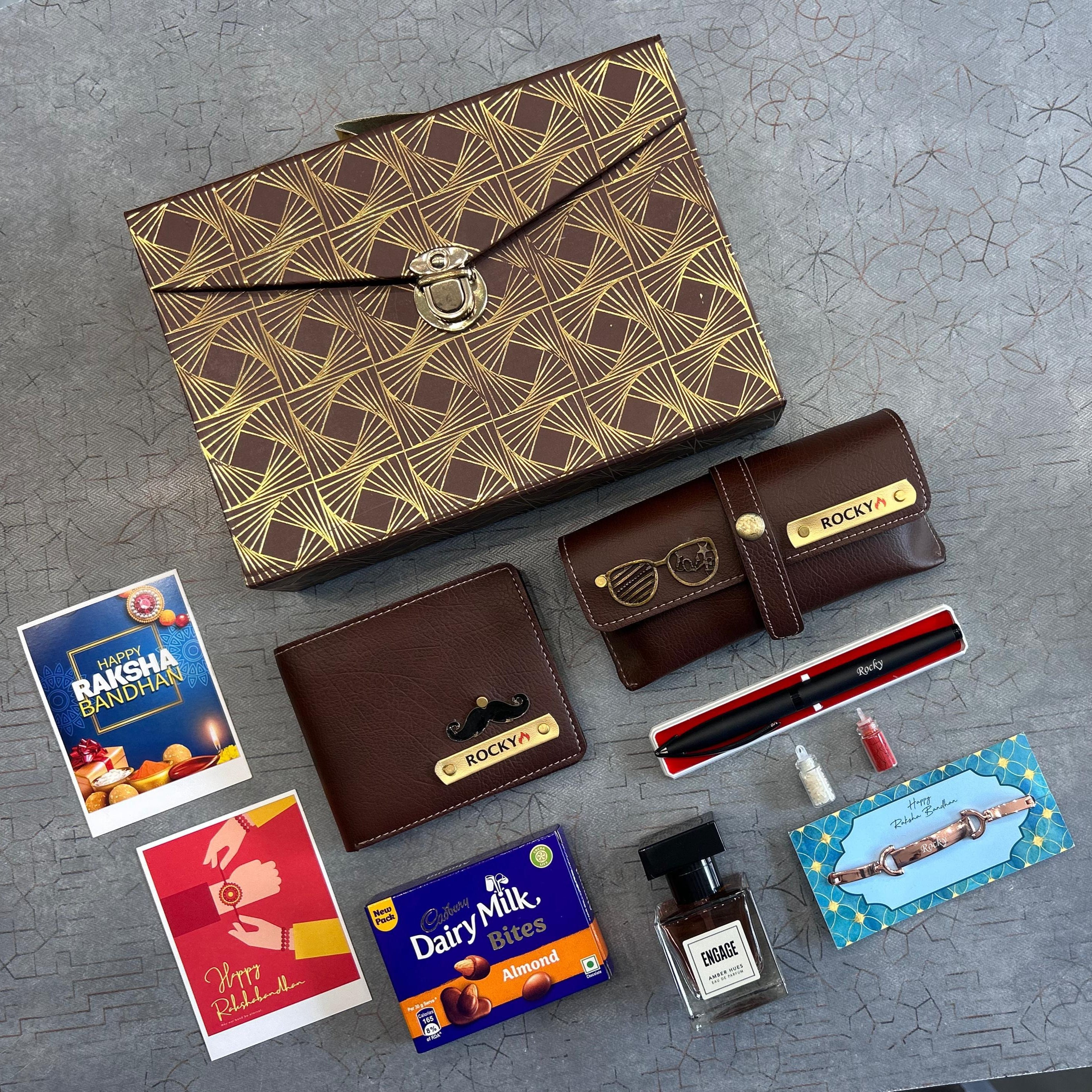 Collection of brown leather items and small products on a textured gray surface - The Gifting Era