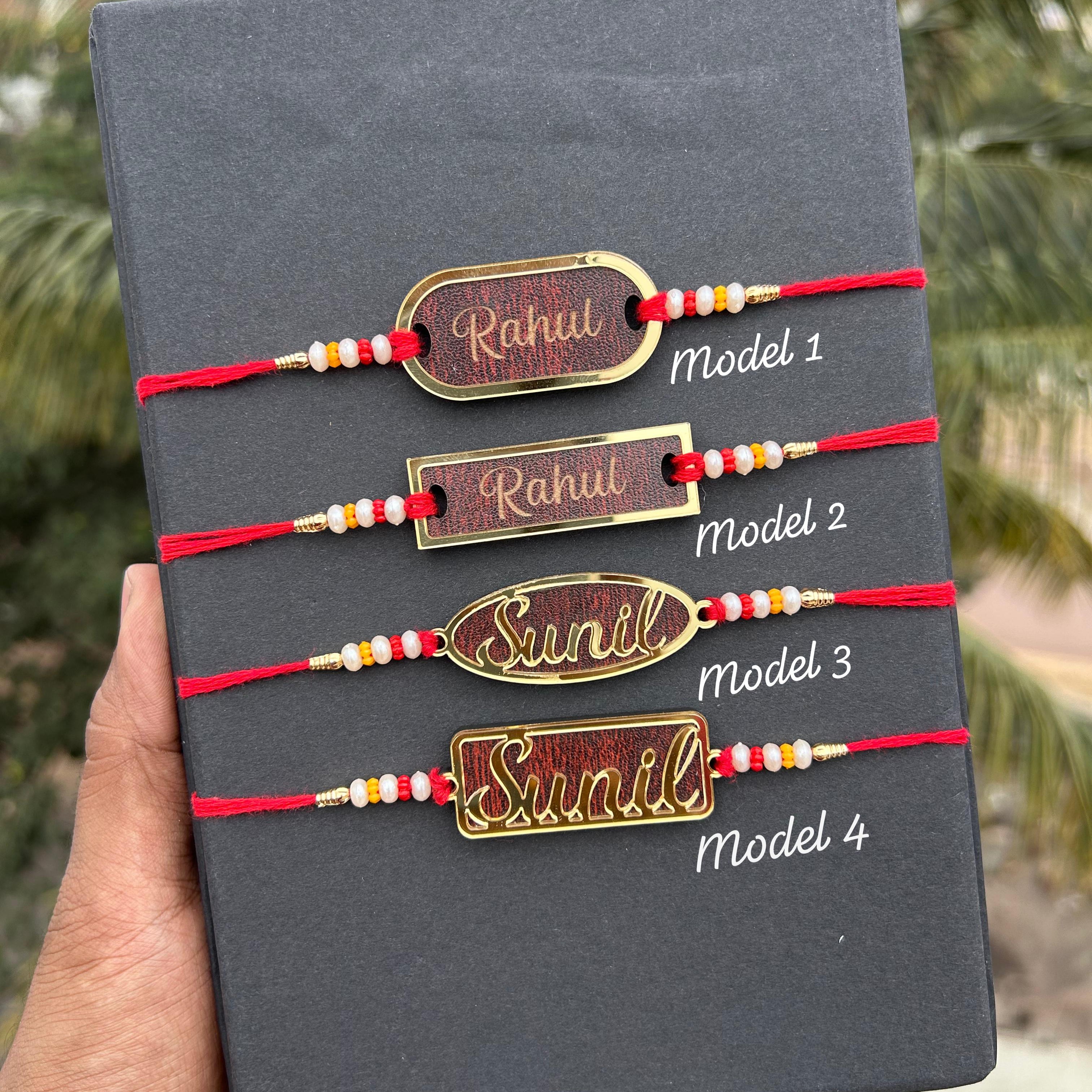 Set of four bracelets with 'Rahul' and 'Sunil' on a dark gray background - The Gifting Era